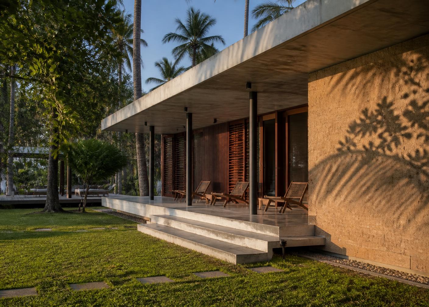 Villa veranda and pool in late afternoon light